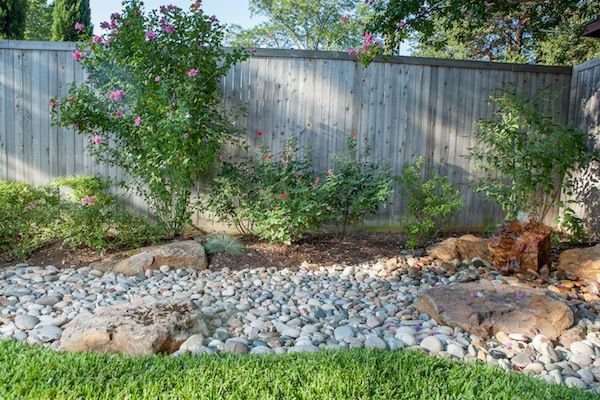 River rock deals flower beds